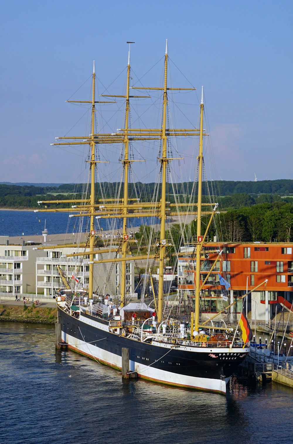 a large black and white boat in a body of water