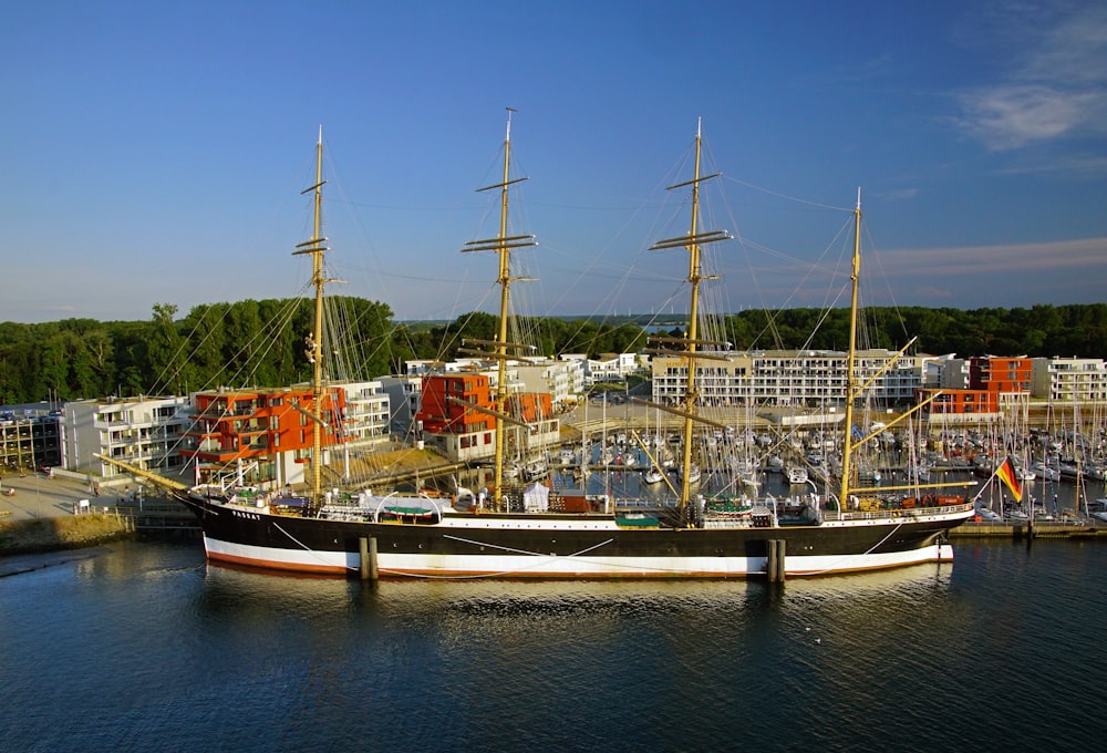 a large black and white boat in the water