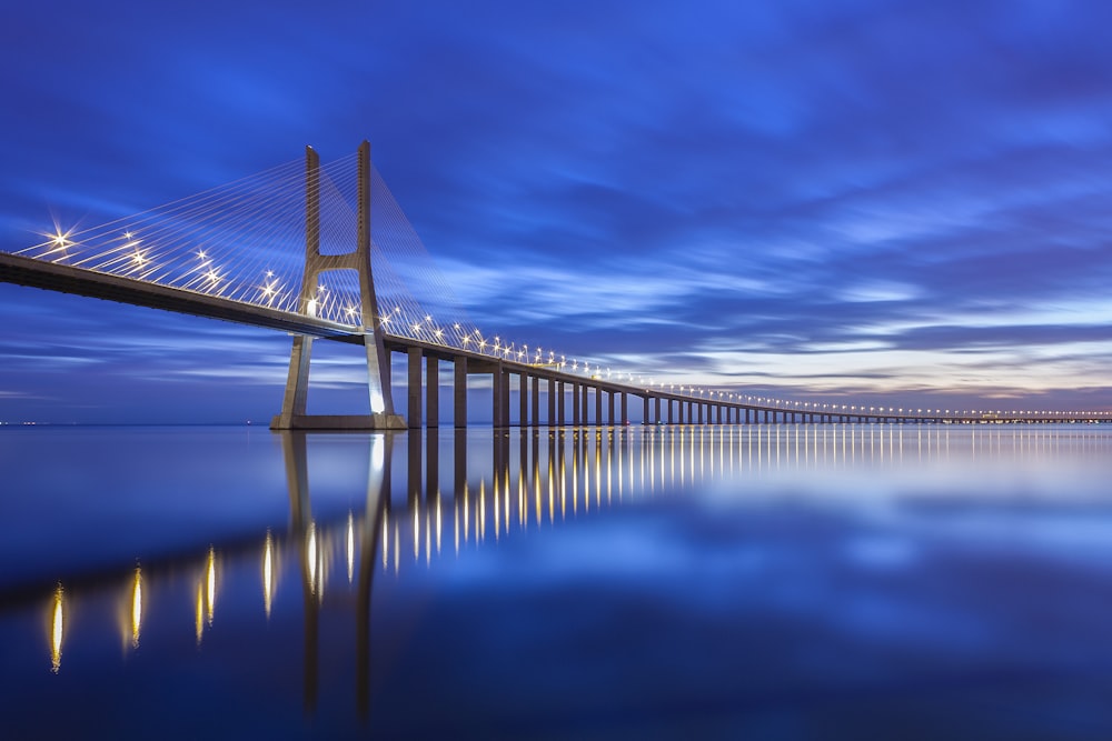 a long bridge spanning over a large body of water