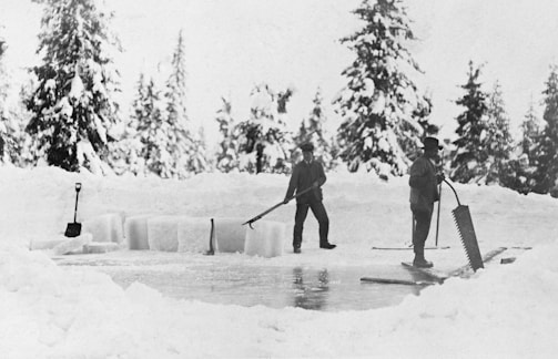 A team of professionals working on an ice installation.