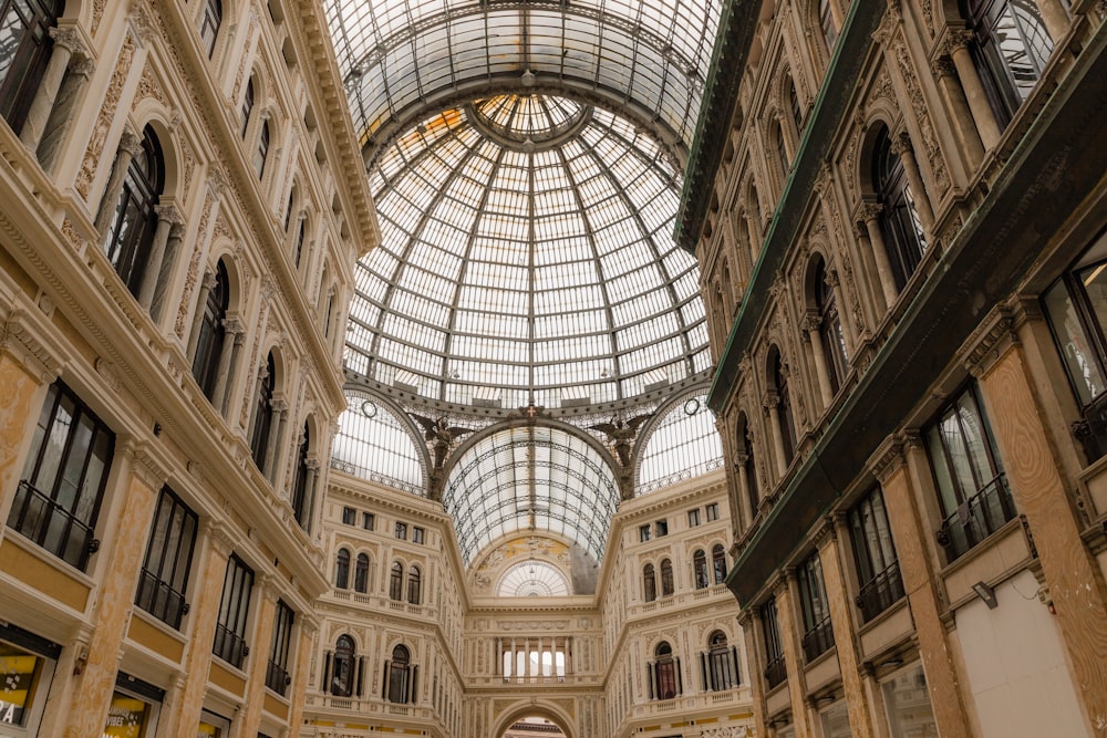 the inside of a building with a glass ceiling