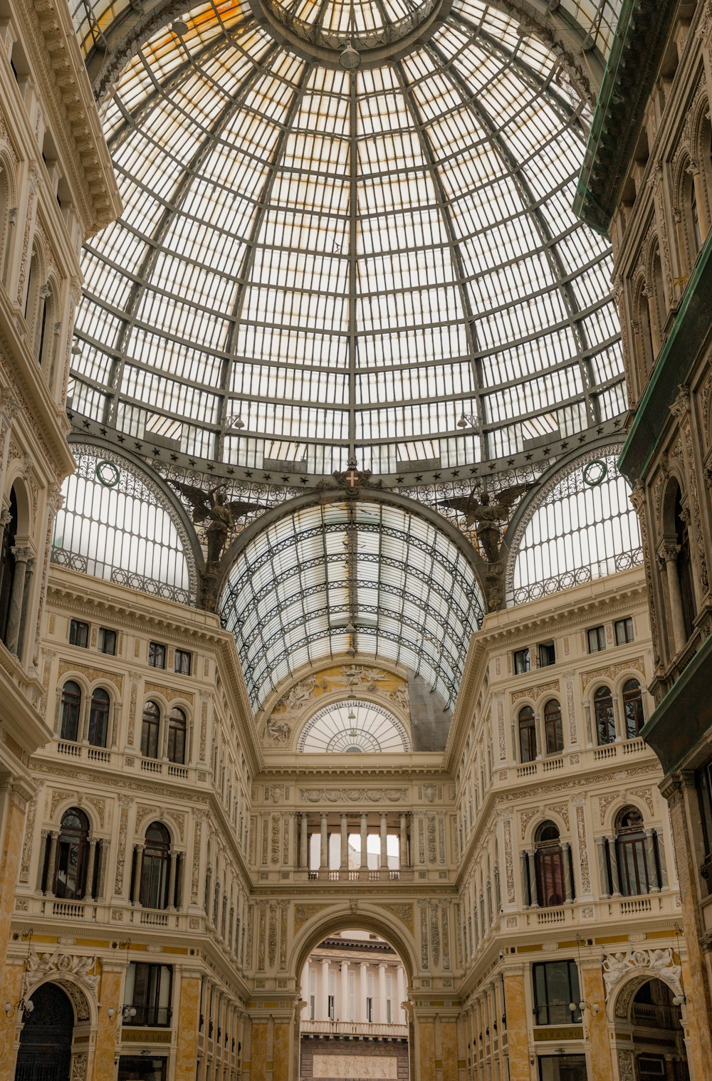 the inside of a building with a glass ceiling