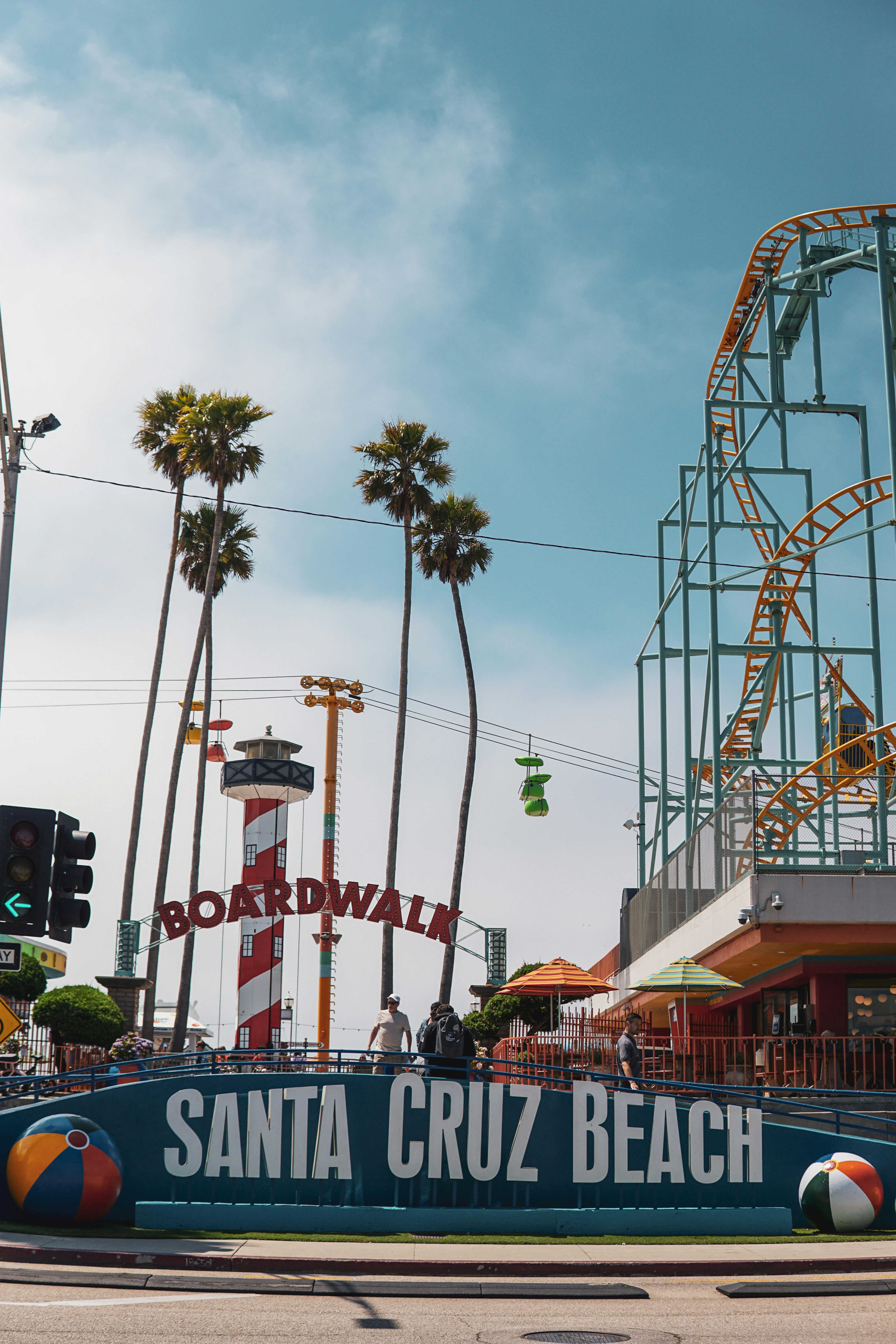 The santa cruz beach roller coaster is on display photo Free Santa