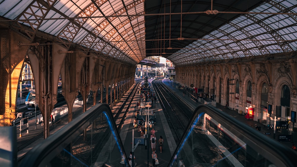 a train station with a train on the tracks