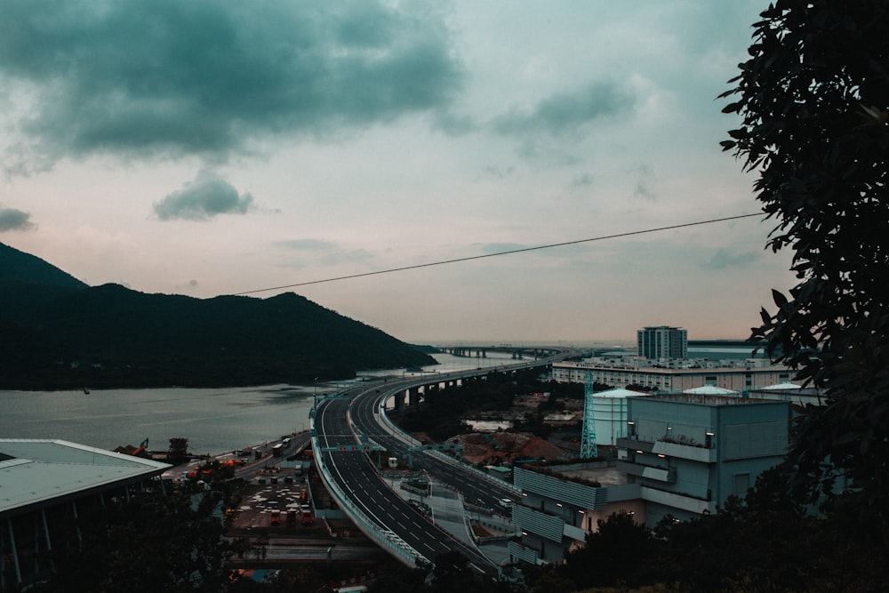 a view of a highway with a bridge in the background