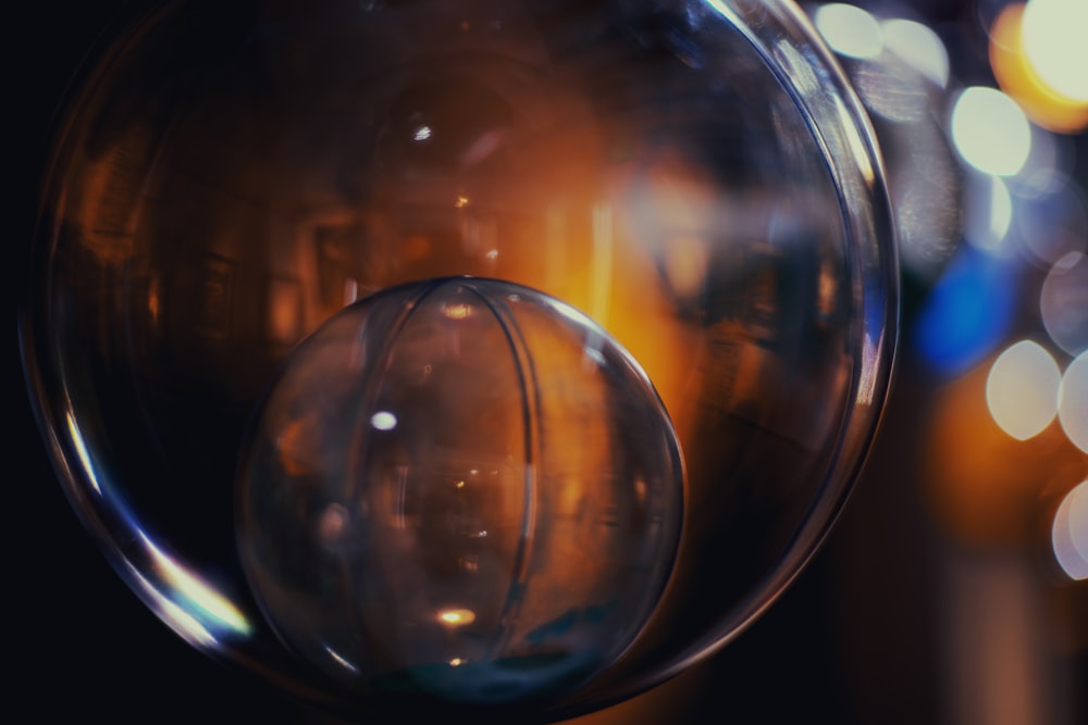 a close up of a glass ball on a table