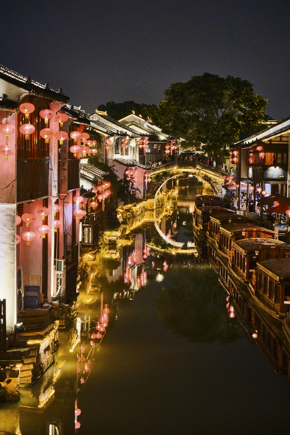 a river running through a city at night