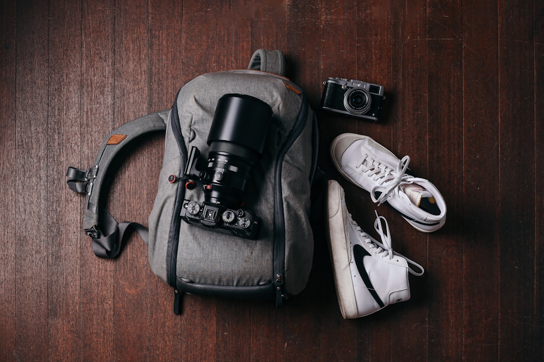 Camera equipment packed in a travel backpack for transport