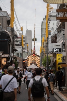 A vibrant street scene in Seoul during a colorful festival with lanterns and traditional hanbok attire.