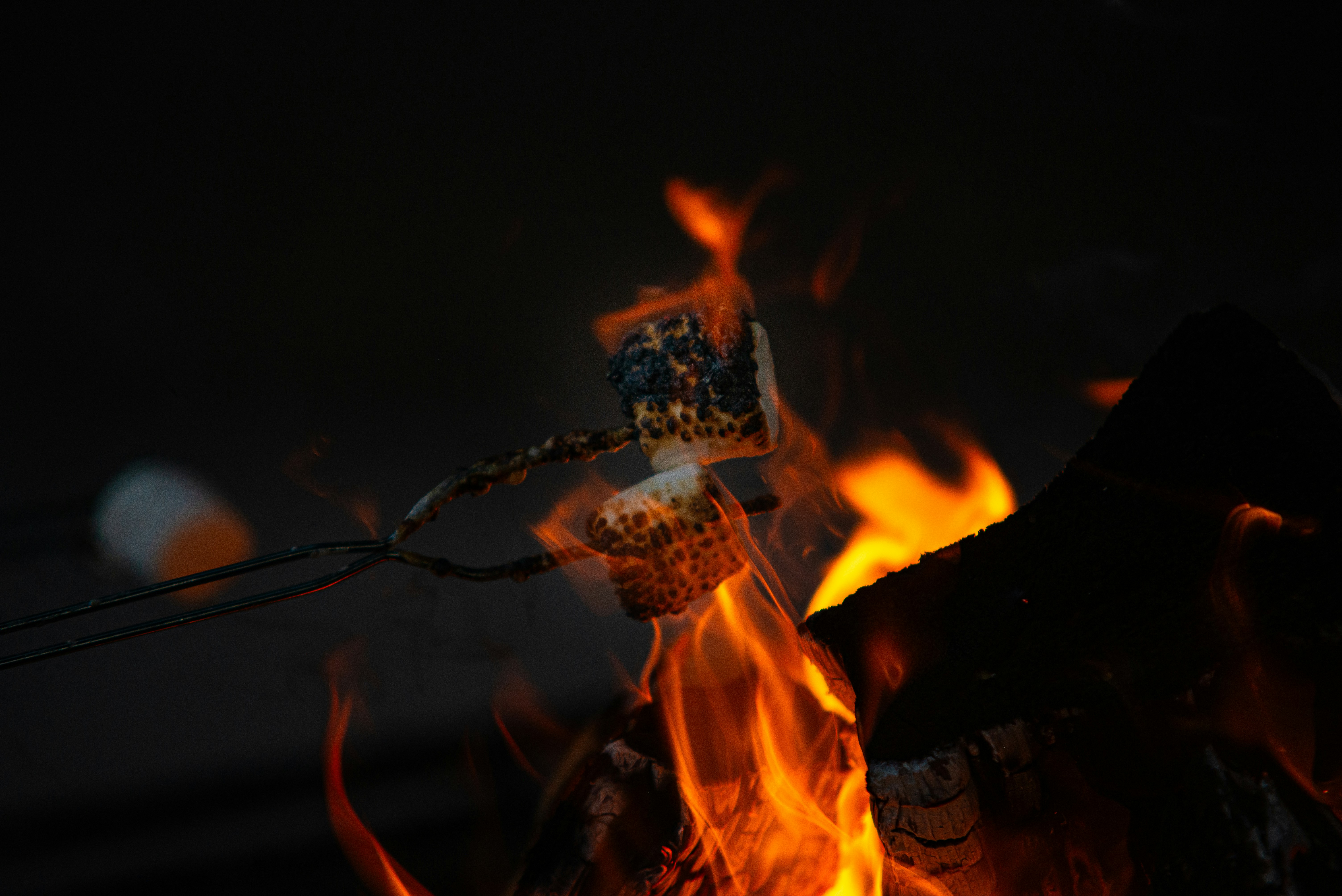 a close up of a fire in the dark