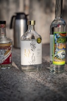 A set of personalized thermos bottles with vibrant sublimation prints arranged neatly.