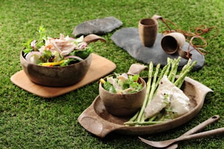 A vibrant plate of colorful, fresh food served in a rustic setting.