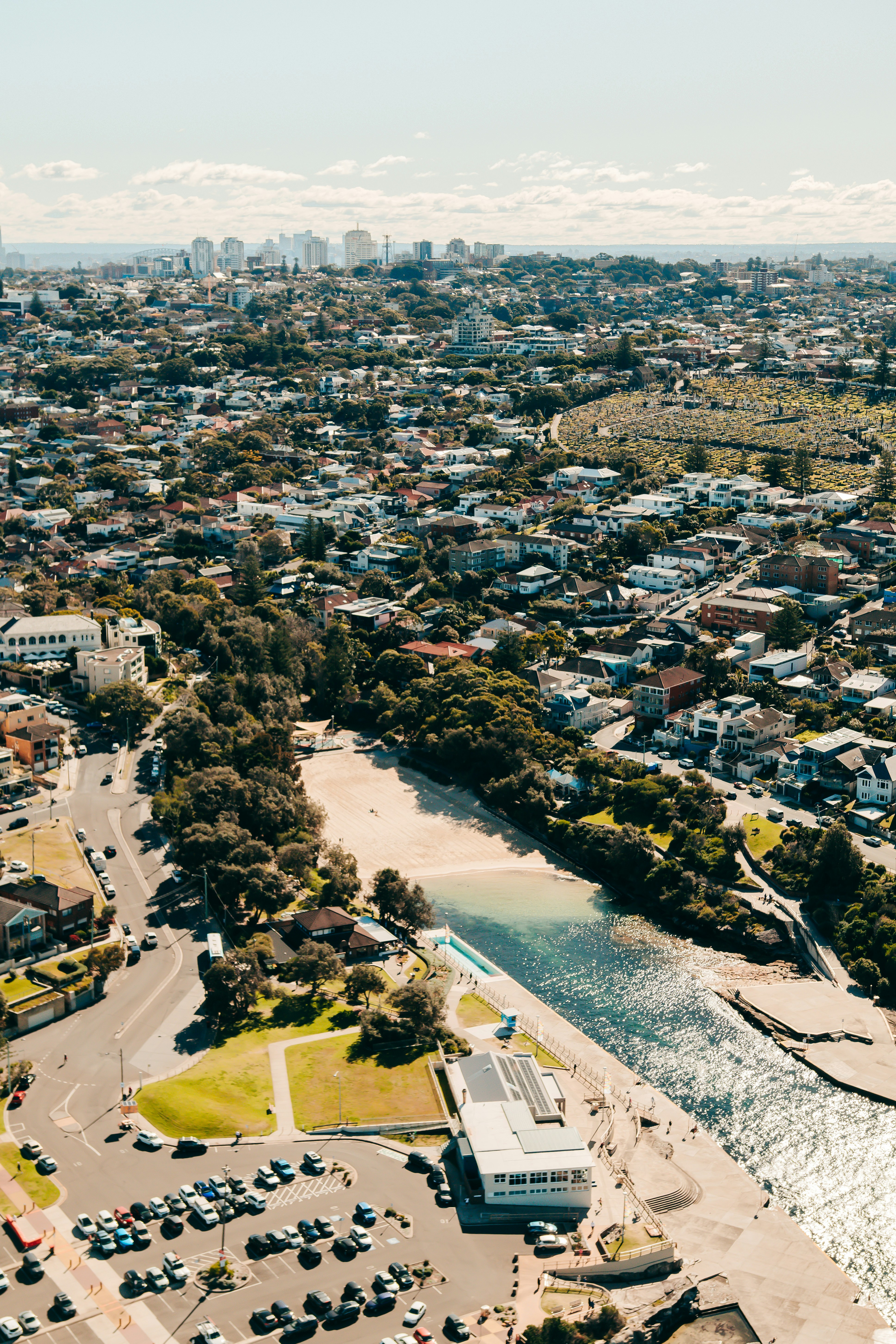 an aerial view of a city with a river running through it
