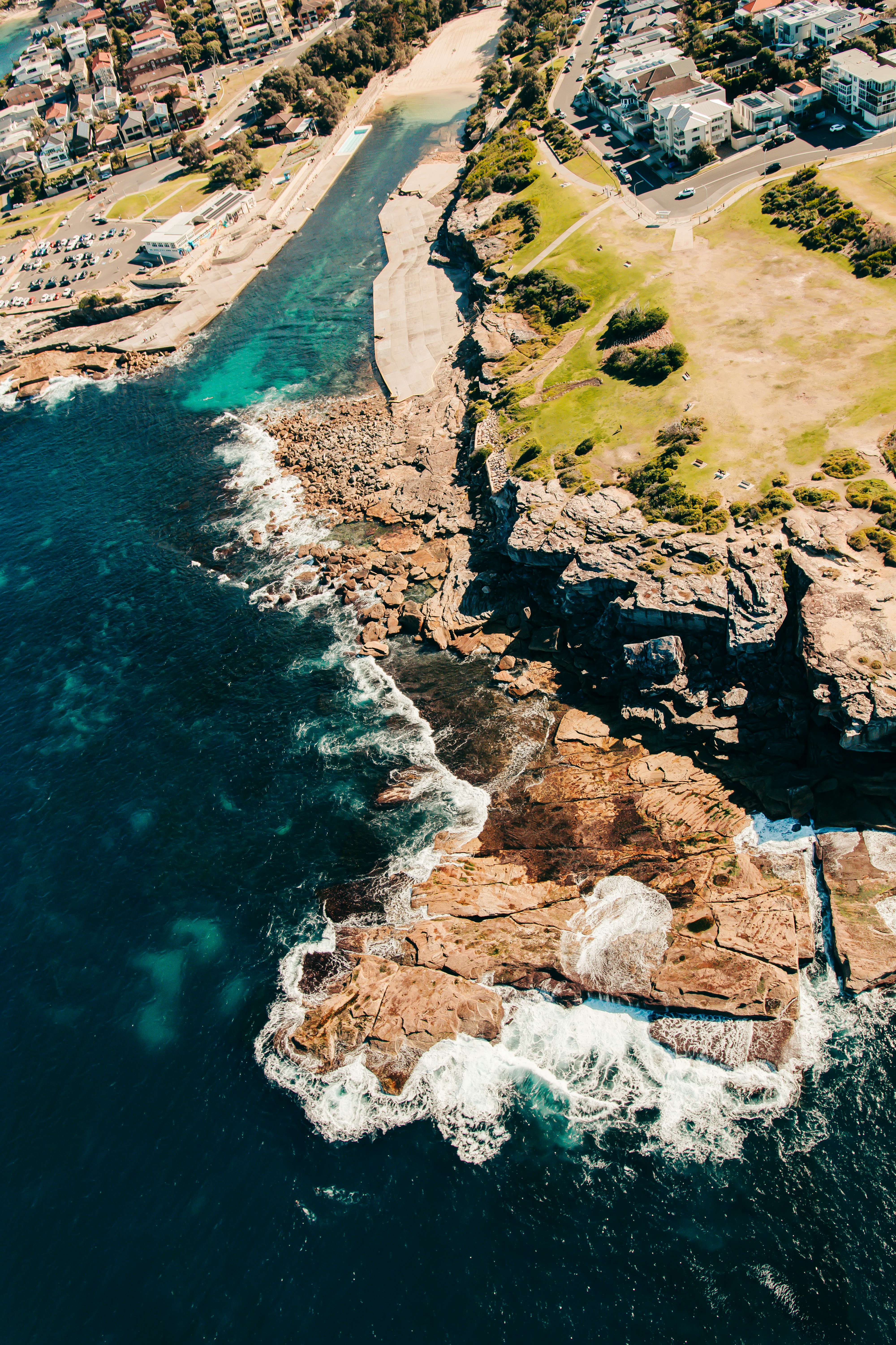 an aerial view of the coastline of a city
