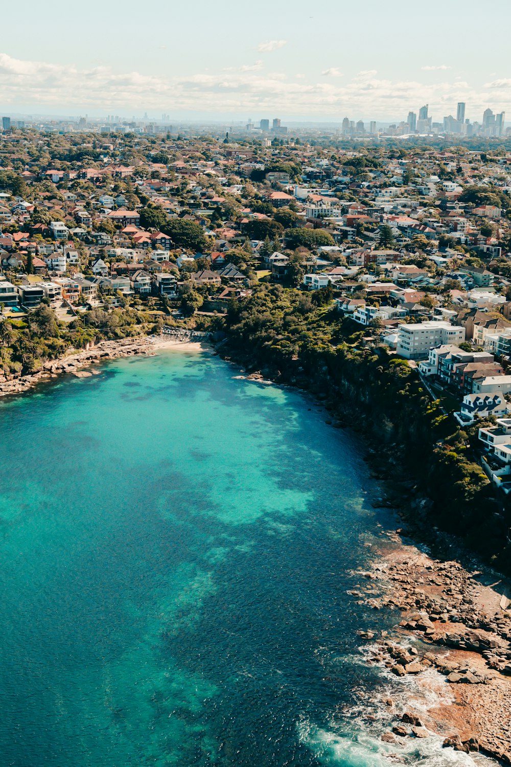 a large body of water surrounded by a city