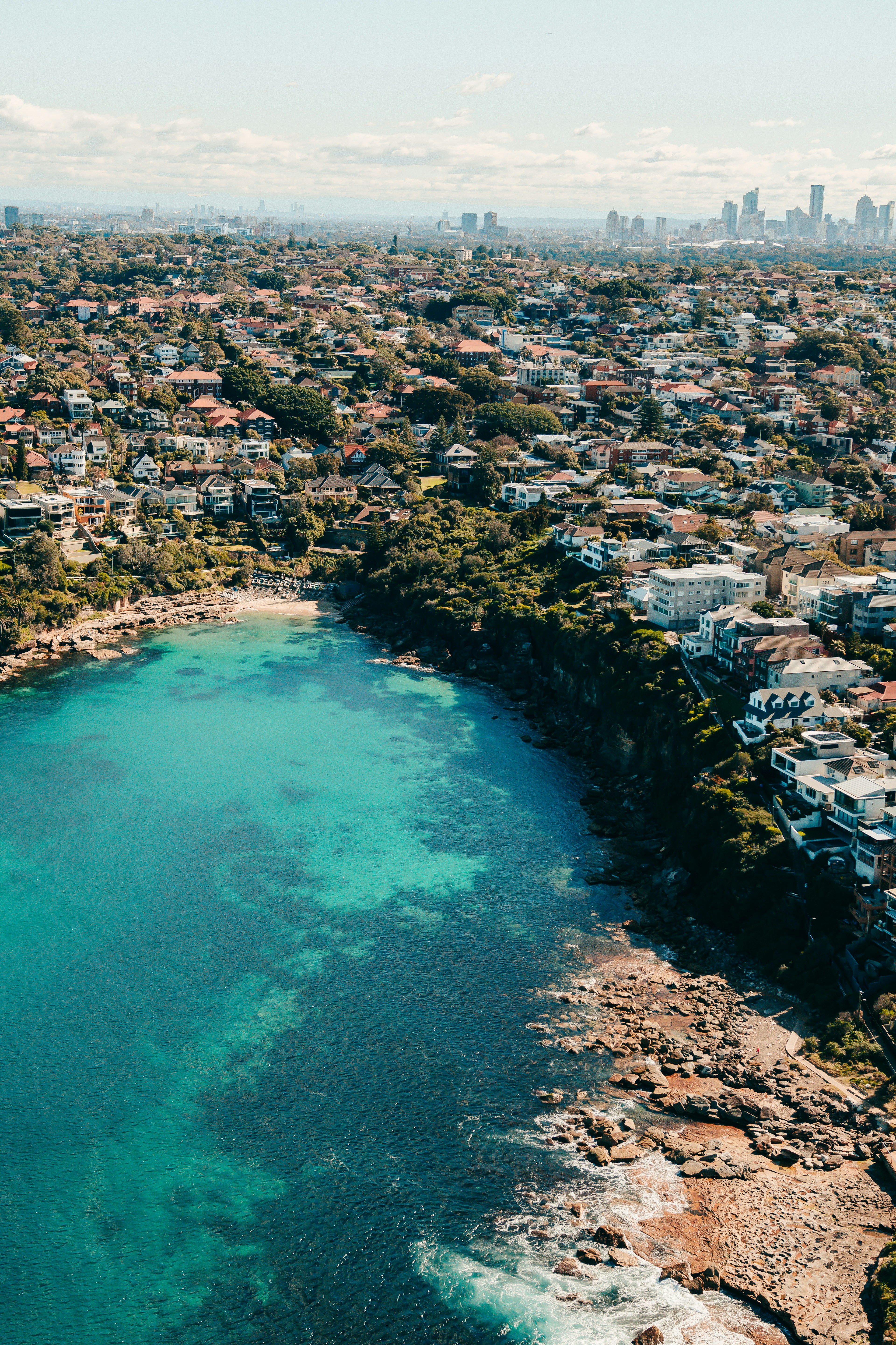 a large body of water surrounded by a city