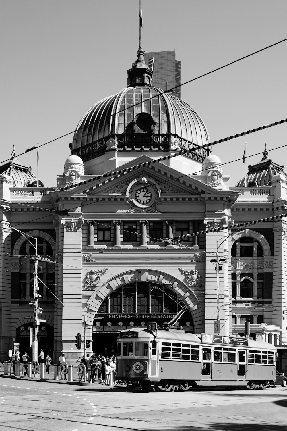 a black and white photo of a train station