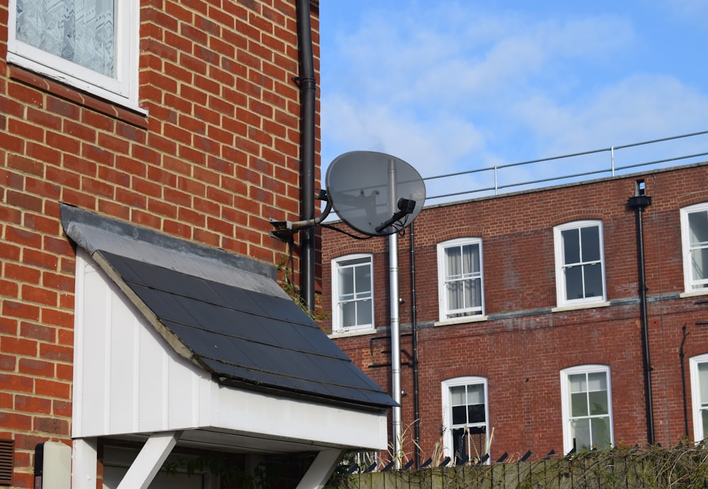 a house with a solar panel on the roof