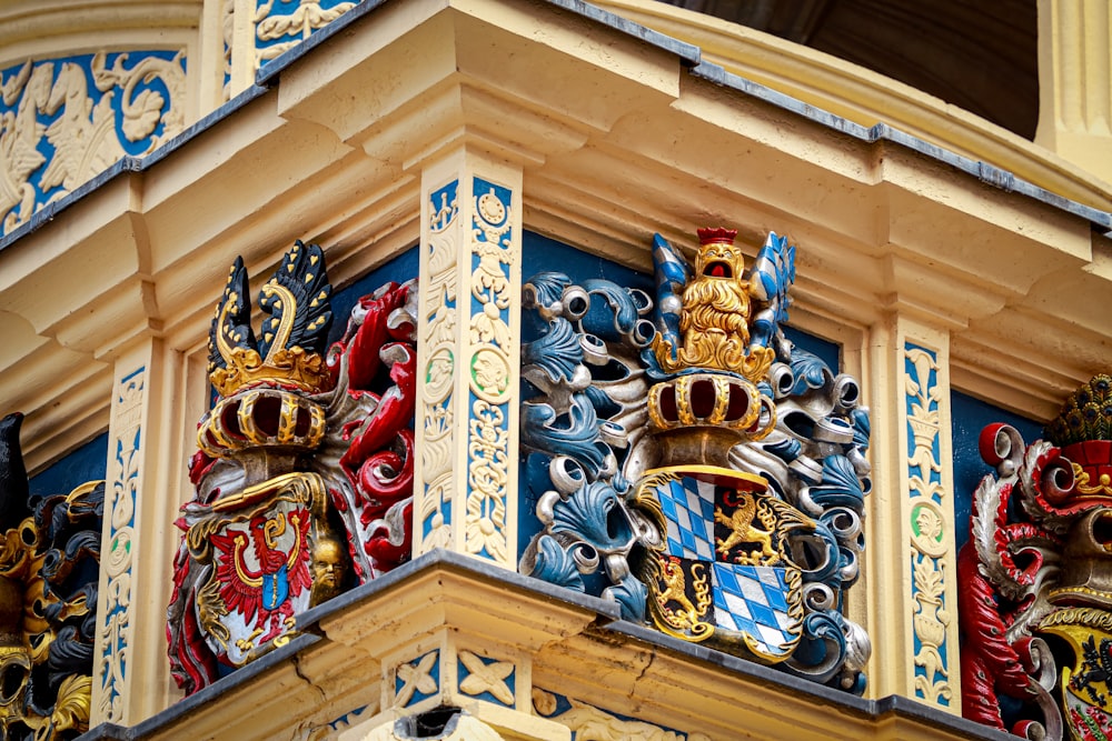 a close up of a building with decorative decorations on it