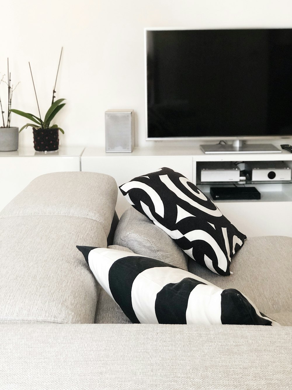 a living room with a couch and a television