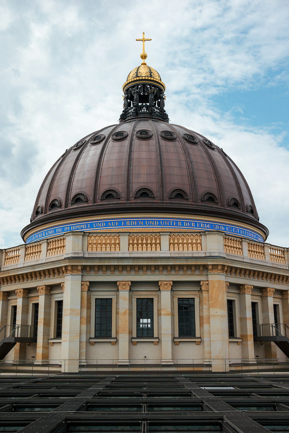 a large dome with a cross on top of it