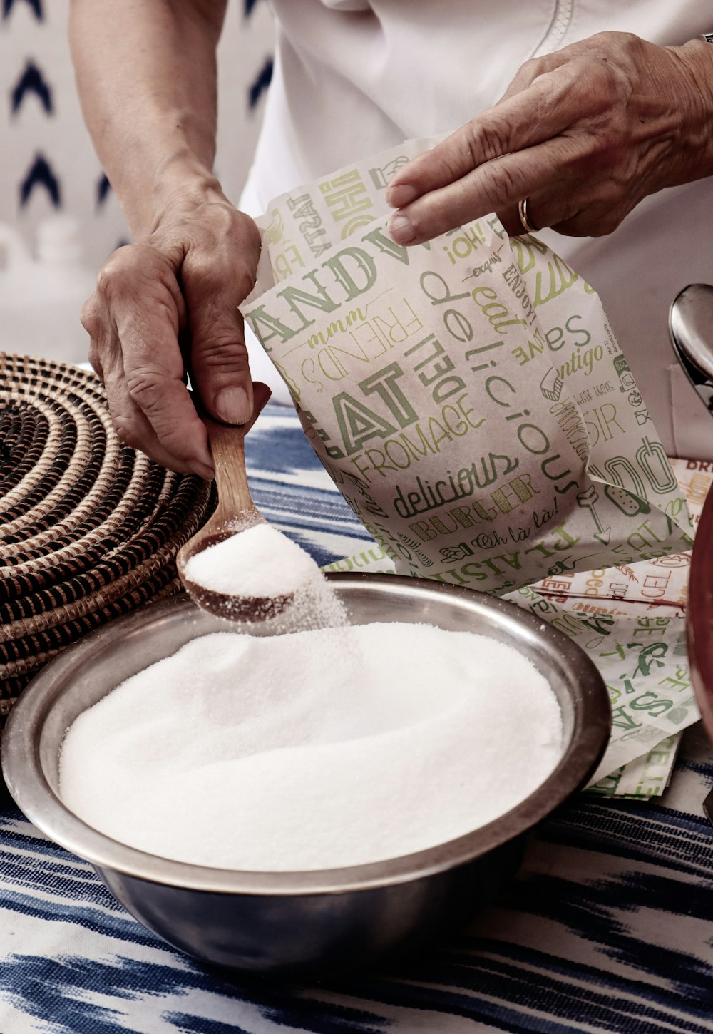 a person in a white shirt and a bowl of food