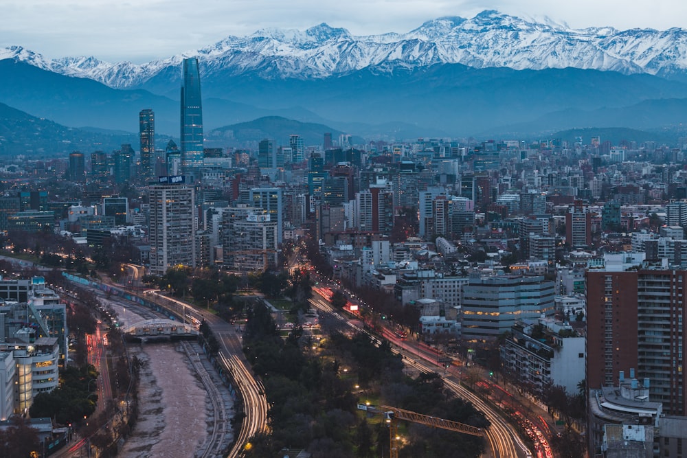 a view of a city with mountains in the background