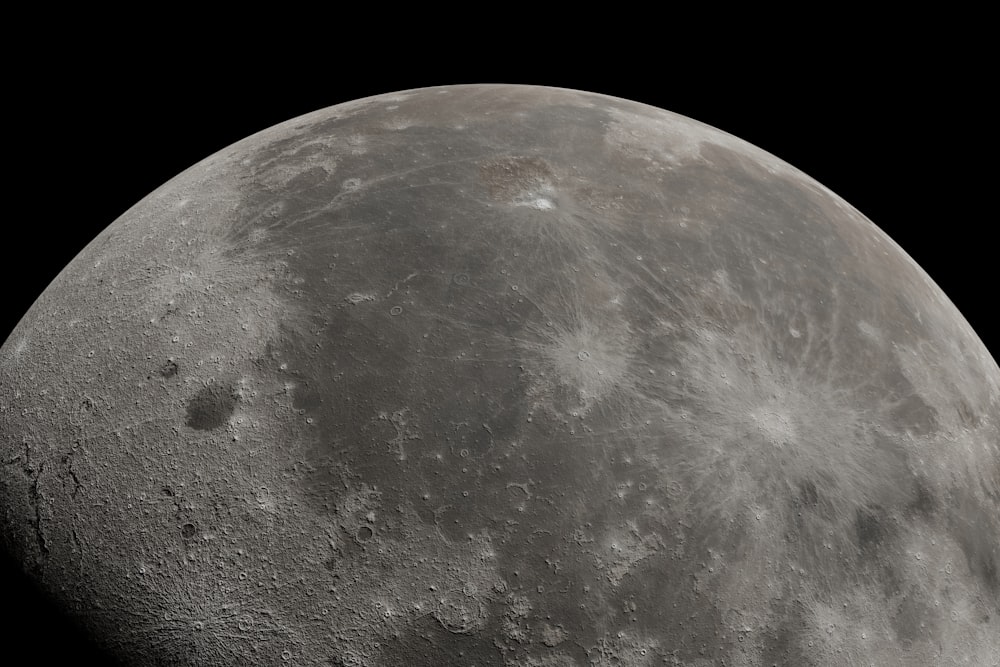 a close up of the moon with a black background