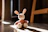 a small stuffed rabbit sitting on a wooden floor