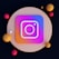 A digital artwork featuring a stylized Instagram logo centered on a circular, beige background. The logo is neon with a gradient of purple, pink, and blue. Surrounding the logo are various colored spheres in shades of red, orange, and yellow.