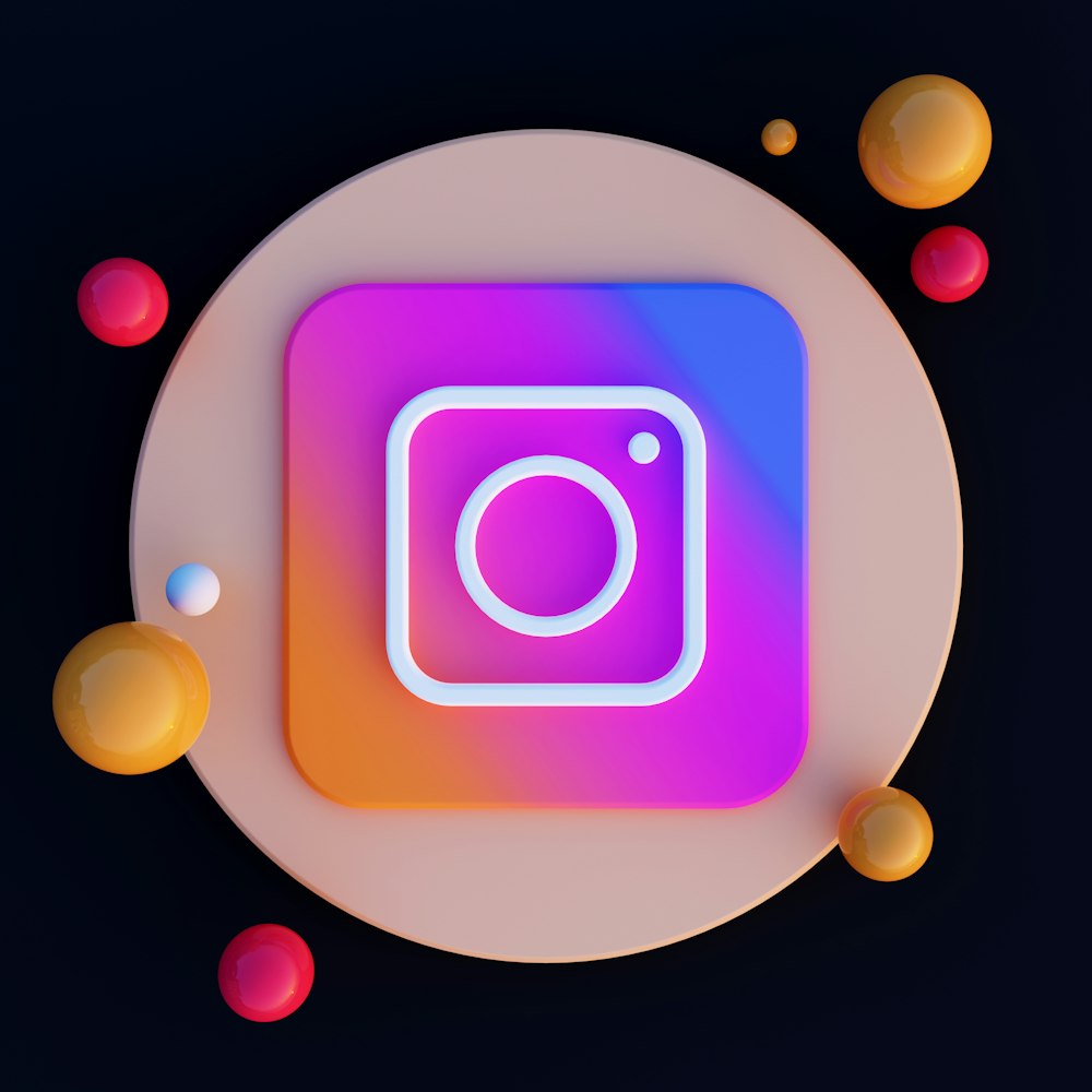 an instagram icon surrounded by bubbles and balls