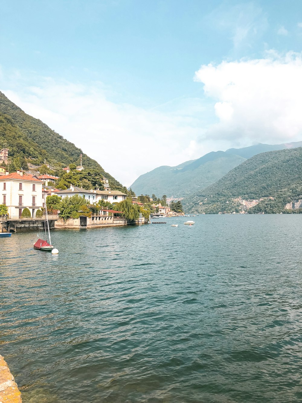 a body of water with a bunch of boats in it