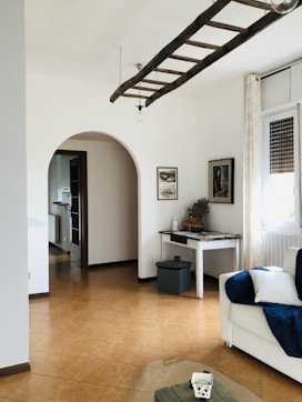 a living room with a couch and a table
