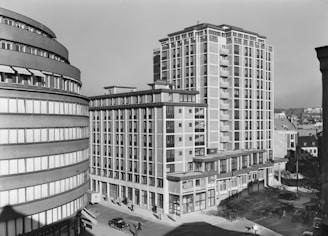 Black and white minimalist urban cityscape with diverse people collaborating