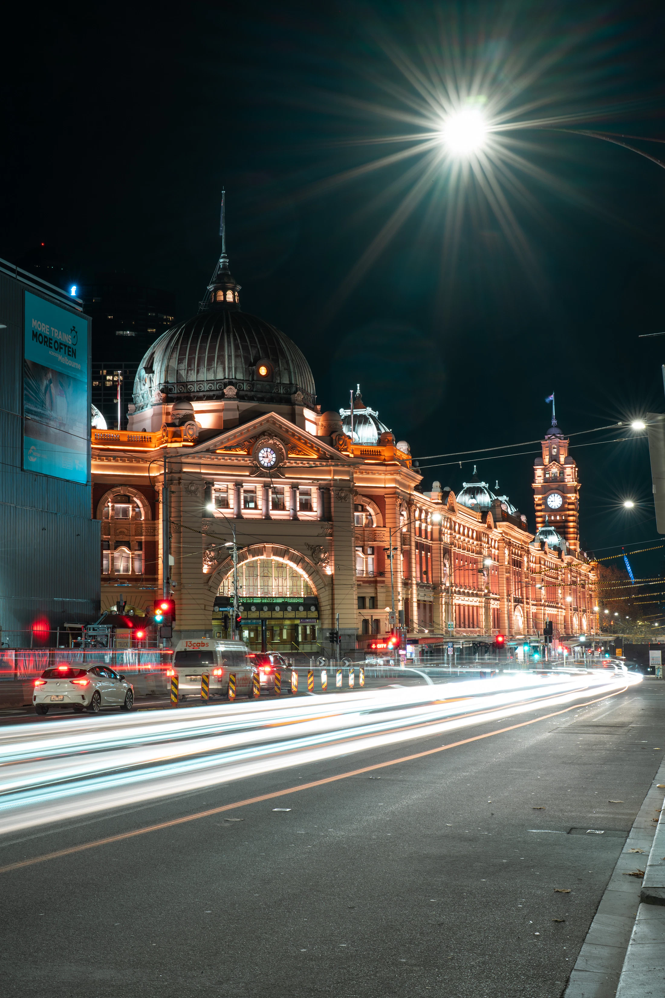 Melbourne skyline at night with the Yarra and CBD lights reflected