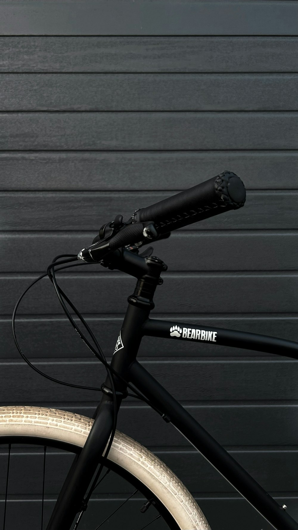 a bike parked in front of a garage door