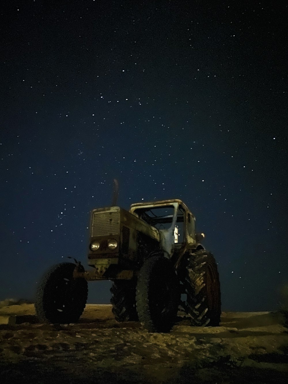 a large truck parked in the middle of a field