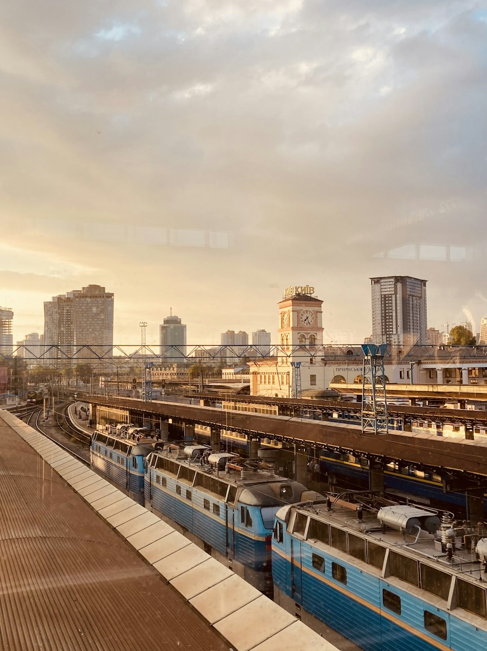 a couple of trains that are sitting on the tracks