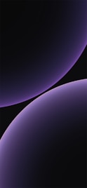 a black and purple iphone wallpaper with a black background