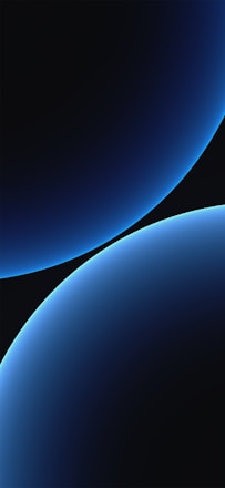 Smooth gradient curves in shades of blue create an abstract and sleek design. The curves intersect with a dark background, giving a sense of depth and modernity.