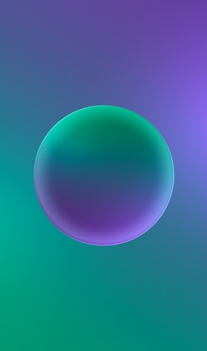 a blurry image of a blue and green bubble