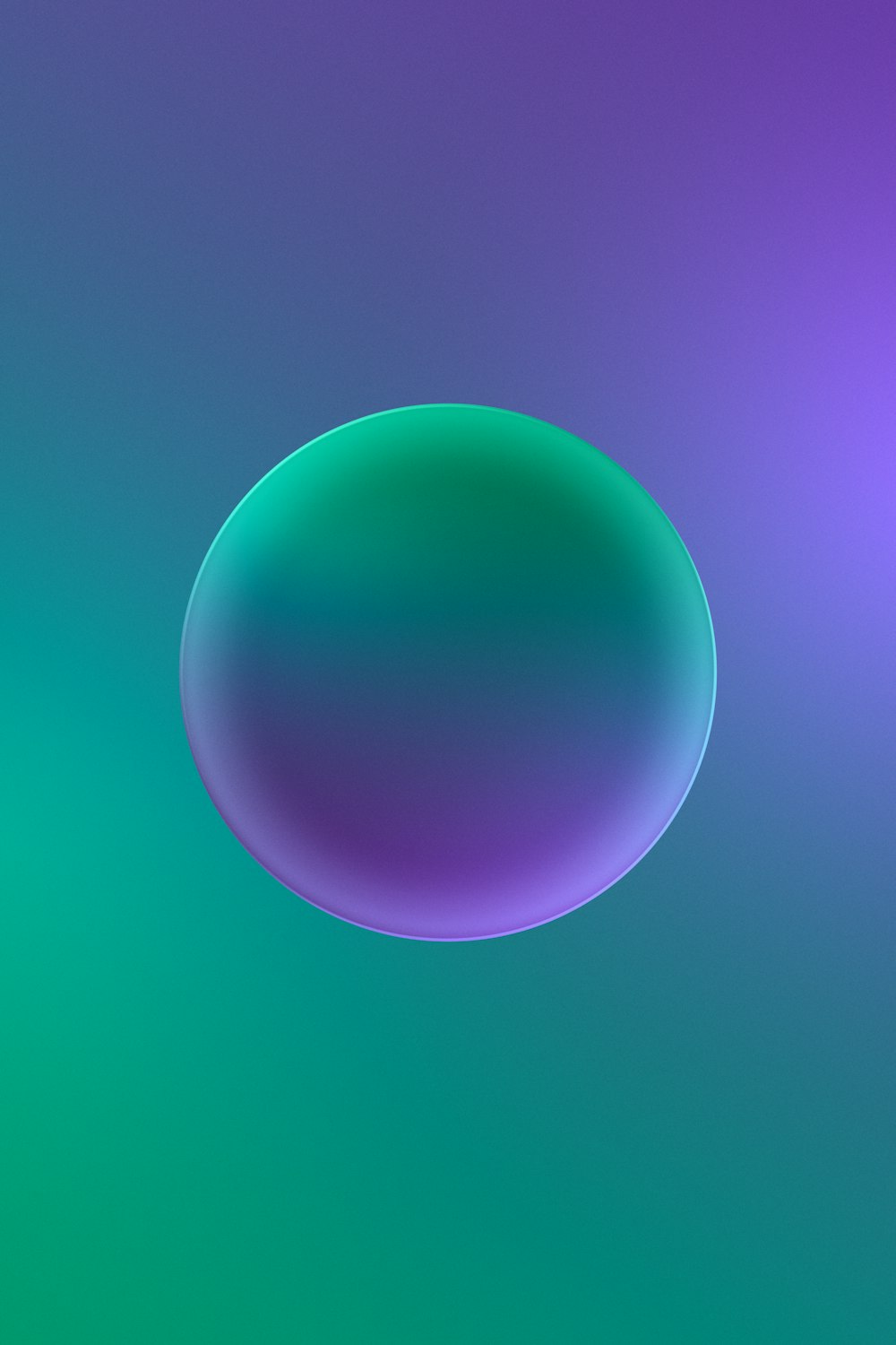 une image floue d’une bulle bleue et verte