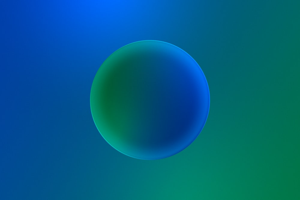 un fond bleu et vert avec une forme circulaire