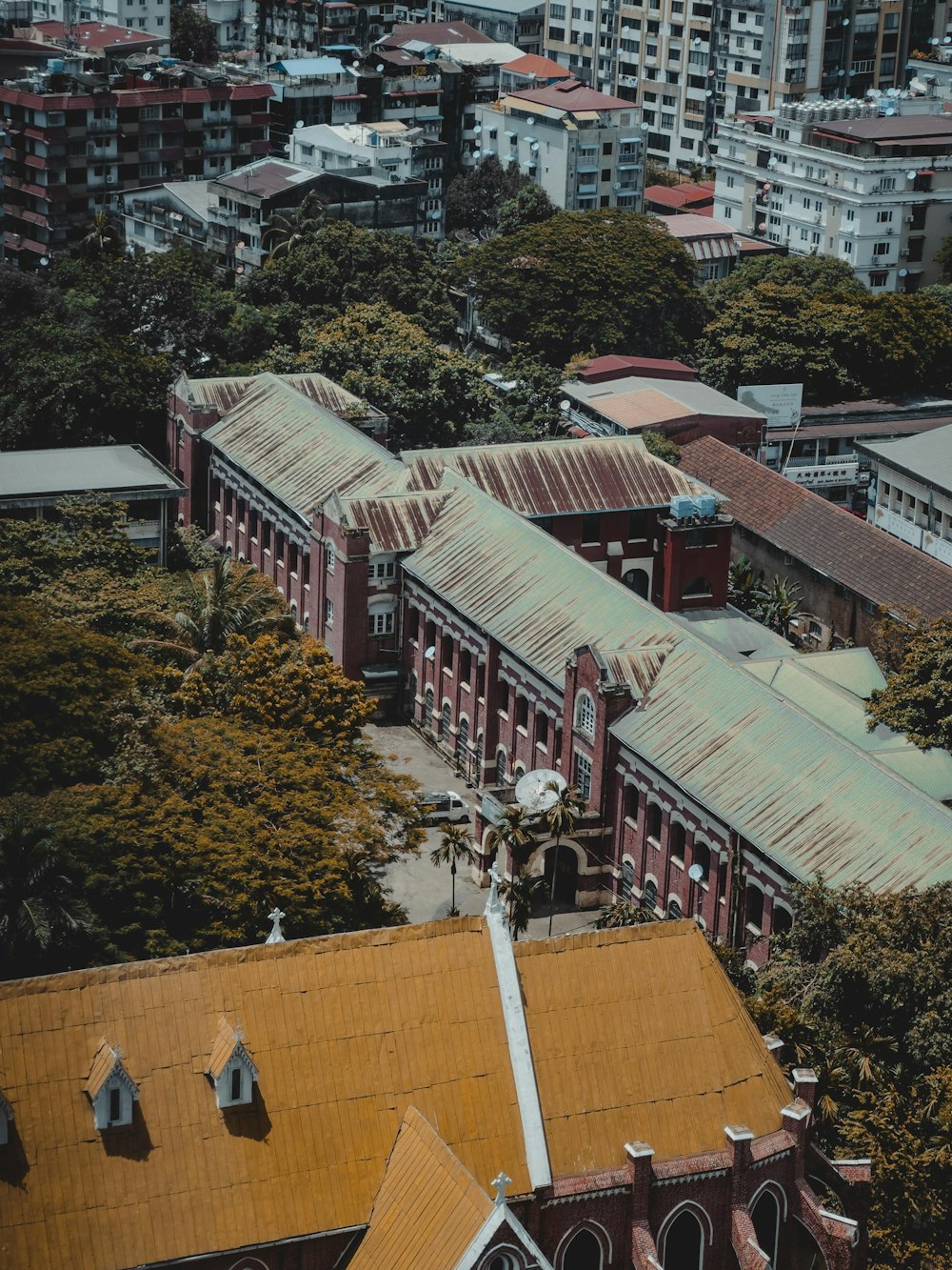 an aerial view of a city with tall buildings