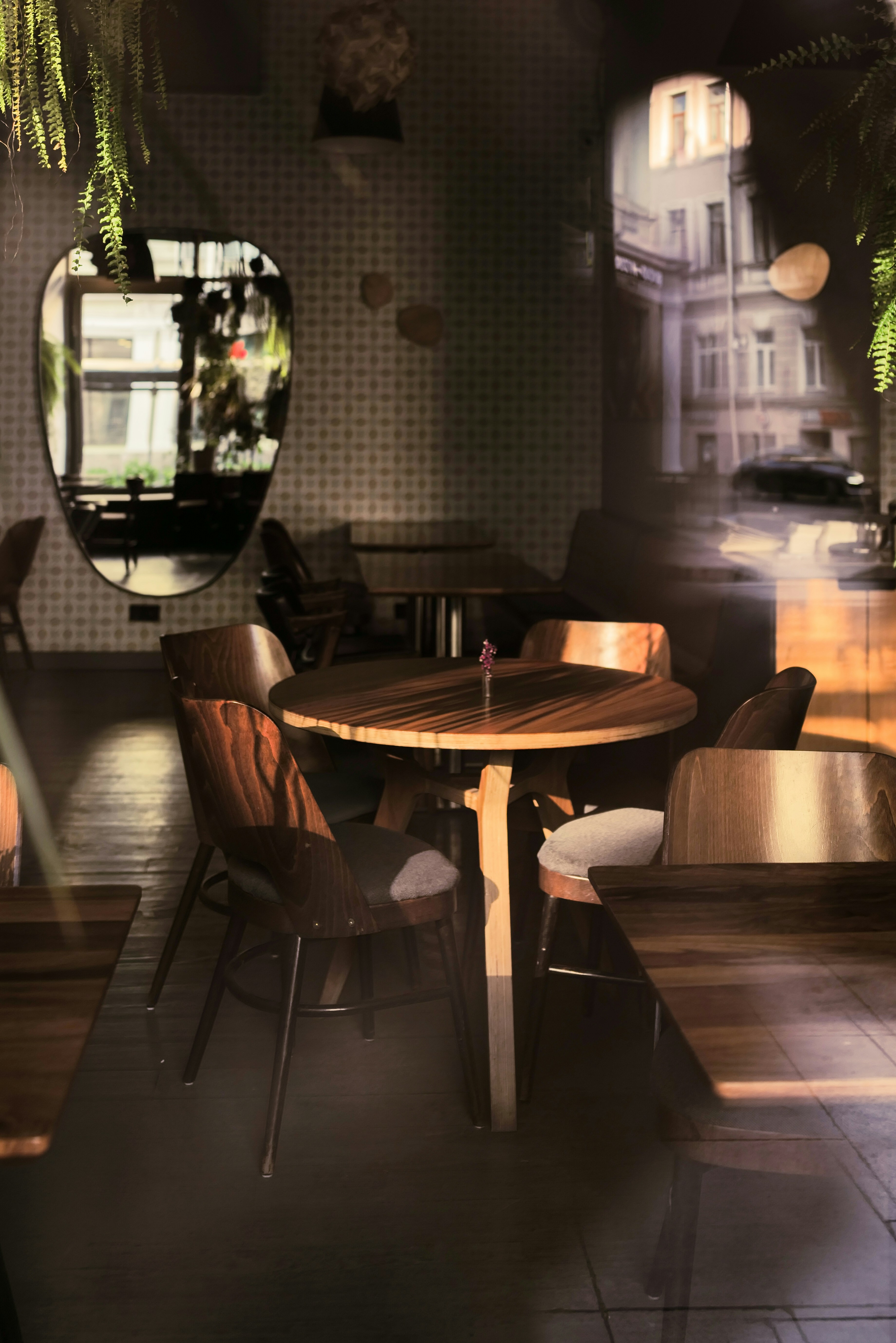 a dining room with a table and chairs