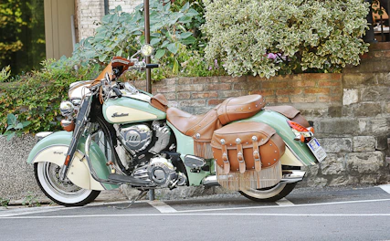 Set of durable motorcycle saddlebags attached to a stylish bike