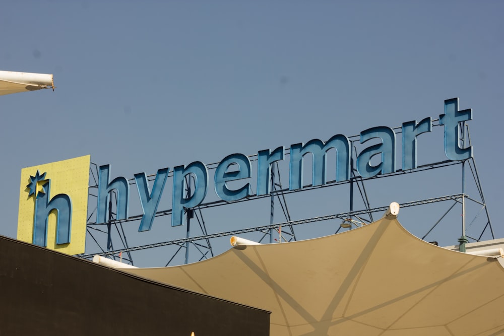 a large sign that says hypemart above a building