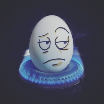 A vibrant digital artwork showing a playful meme character cooking on a futuristic Solana-themed stove.