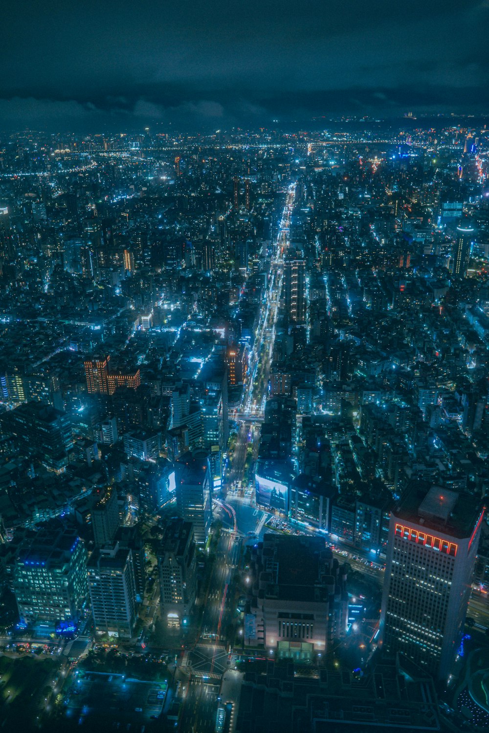 an aerial view of a city at night