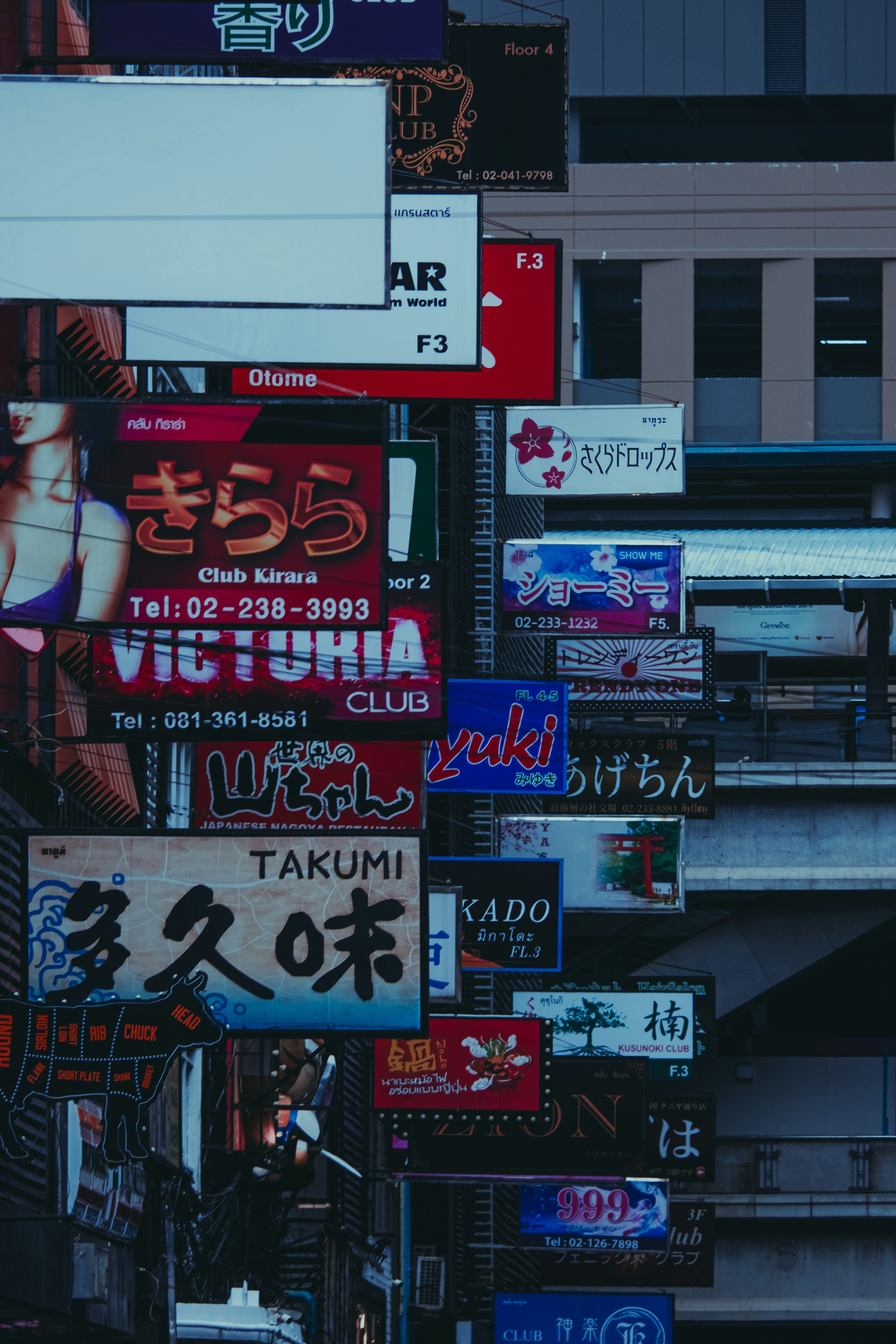 a city street filled with lots of signs